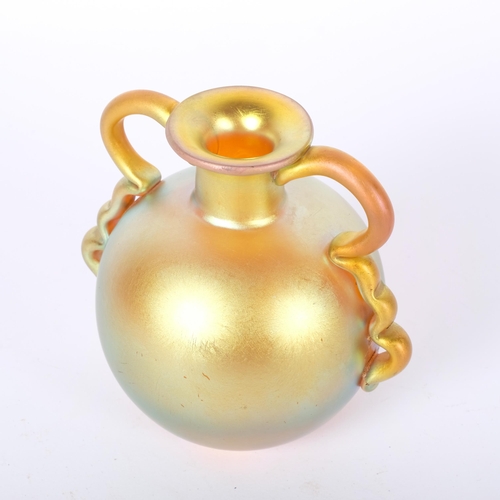 217 - WMF - An early 20th century Myra-krystall 2 handled globular glass vase with gold and purple iridesc... 