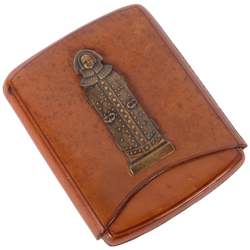 228 - A German leather cigar case, with applied erotic metal panel 