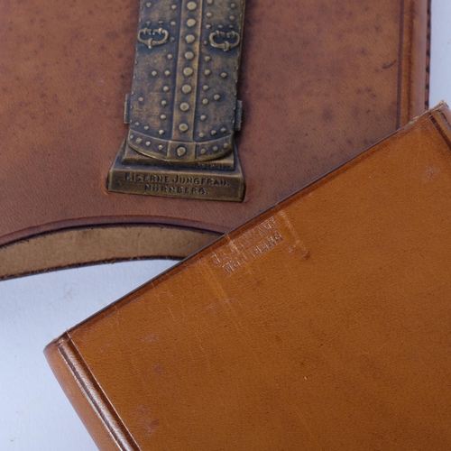 228 - A German leather cigar case, with applied erotic metal panel 