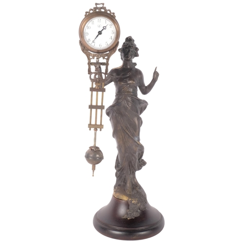 229 - An Art Nouveau style bronze figural mystery clock, H34cm