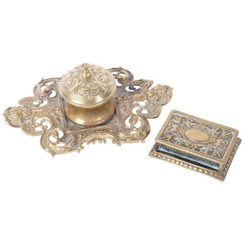 231 - A Roccoco ormolu desk inkwell and a cast and embossed brass vesta box (2).