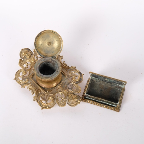 231 - A Roccoco ormolu desk inkwell and a cast and embossed brass vesta box (2).