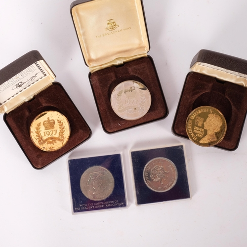 234 - A group of coins to include: 2 x 22ct gold on silver limited edition silver Jubilee coins (4682+4675... 