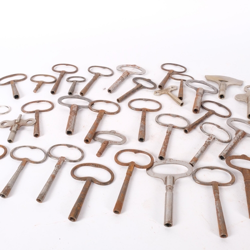 242 - A large quantity of steel and iron clock keys.