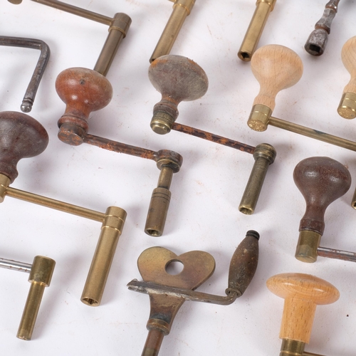 243 - A collection of various long case and other clock keys.