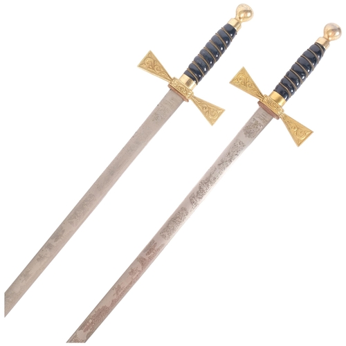 62 - A pair of Elizabeth II commemorative swords, by Wilkinson Sword Co. With brass hilts and etched blad... 