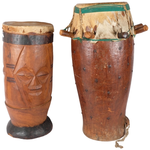 70 - 2 African hardwood drums. Tallest - 63cm.