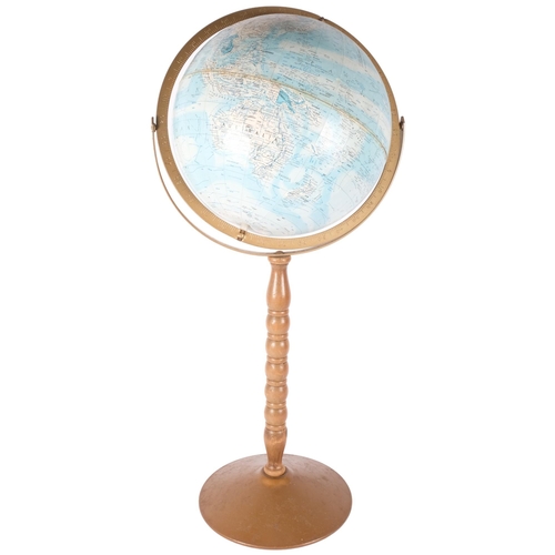 71 - A Replogle world nation series terrestrial 12 inch globe on stand.