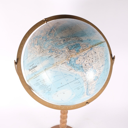 71 - A Replogle world nation series terrestrial 12 inch globe on stand.