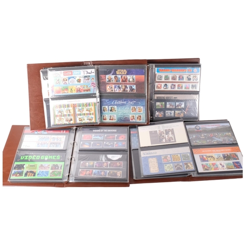 86 - 7 albums of Royal Mail presentation packs, dates including 2001 to 2021.