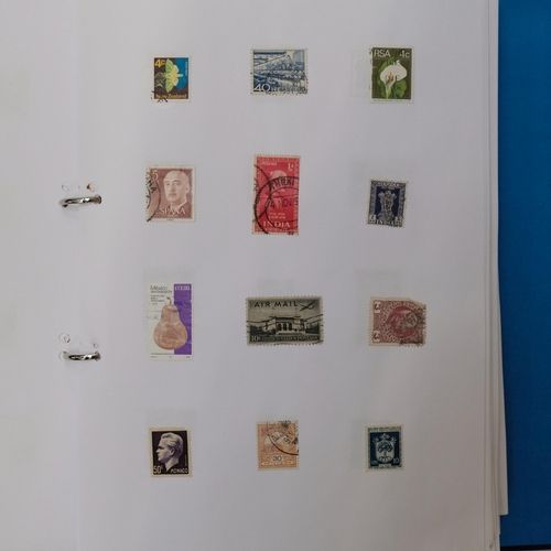 92 - A large quantity of world stamps across 13 albums.