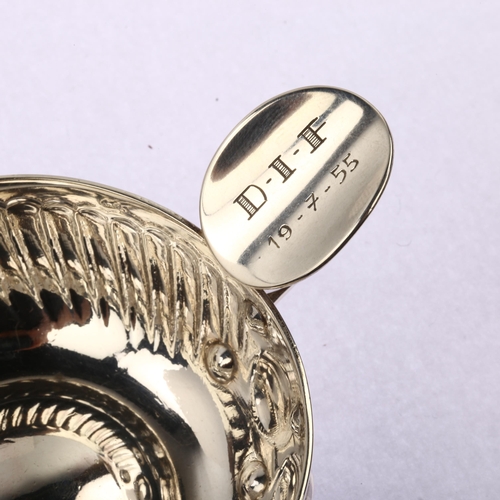 897 - A French silver wine taster, with relief embossed decoration, indistinct maker's mark, bowl diameter... 