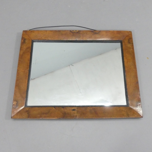 2254 - An antique walnut and ebonised framed rectangular wall mirror. 75x60cm.