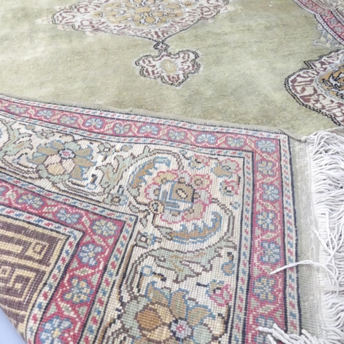 2256 - A cream-ground Herek rug. 183x122cm.