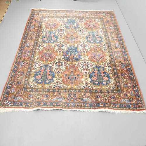 2259 - A red-ground Keshan carpet. 222x174cm