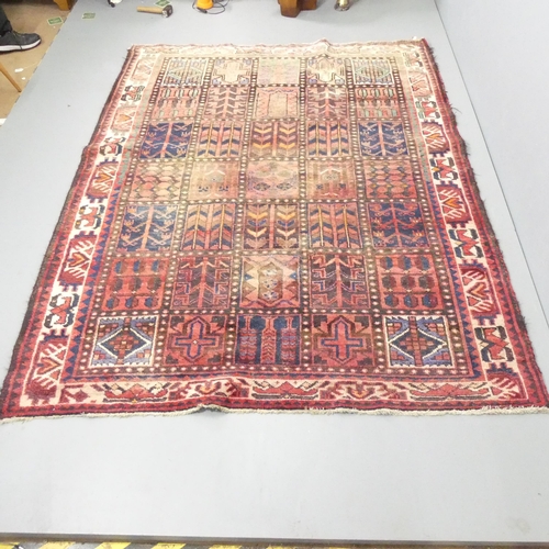 2263 - A red-ground Hamadan carpet. 240x183cm