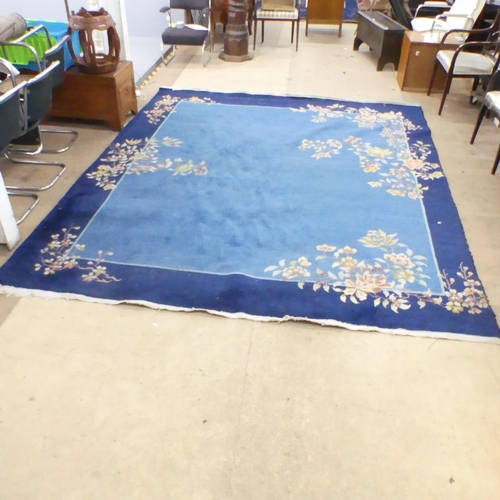 2285 - A blue ground Chinese Mandarin carpet. 318x268cm.