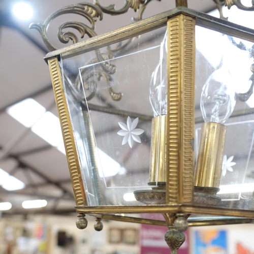 181 - A brass hexagonal wall lantern, with etched glass panels, drop approx 60cm