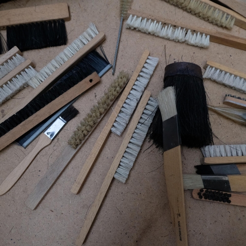 327 - 2 boxes of household brushes, including a broom head, 27cm across