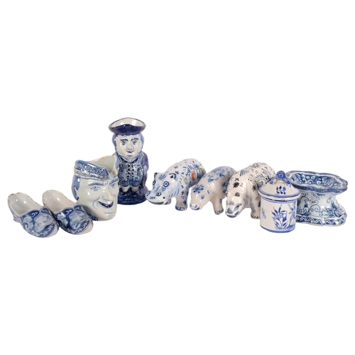 463 - 2 faience pottery hippos, a rhino, a pair of slippers, Delft Toby jug, 11cm etc