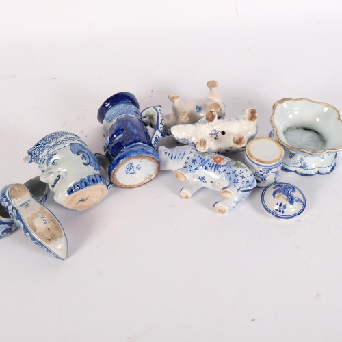 463 - 2 faience pottery hippos, a rhino, a pair of slippers, Delft Toby jug, 11cm etc