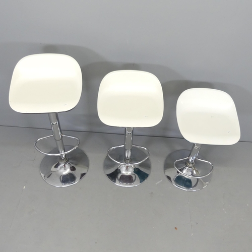 2551 - Three mid-century style moulded bar stools on chrome bases, with rise and fall mechanisms. Max heigh... 