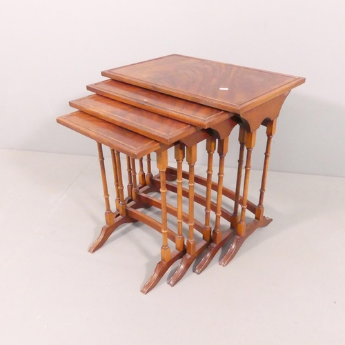 2697 - A mahogany quartetto nest of four occasional tables, an oak cantilever sewing box on stand, 50x57x31... 