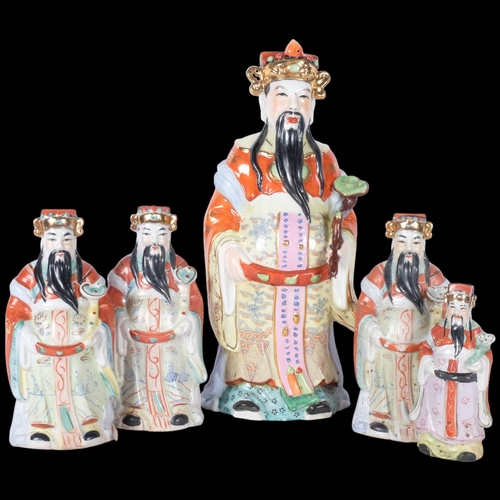 414 - A group of Oriental porcelain figures, tallest 35.5cm