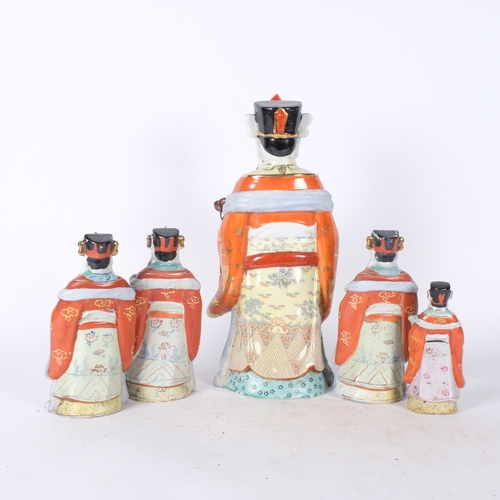 414 - A group of Oriental porcelain figures, tallest 35.5cm