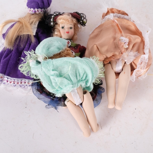 420 - A set of 4 miniature porcelain modern dolls with jointed limbs, 12cm