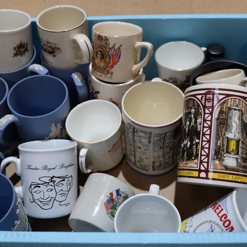 424 - A boxful of Royal commemorative mugs, including Wedgwood Jasperware, and Trafalgar and Bayeux tapest... 