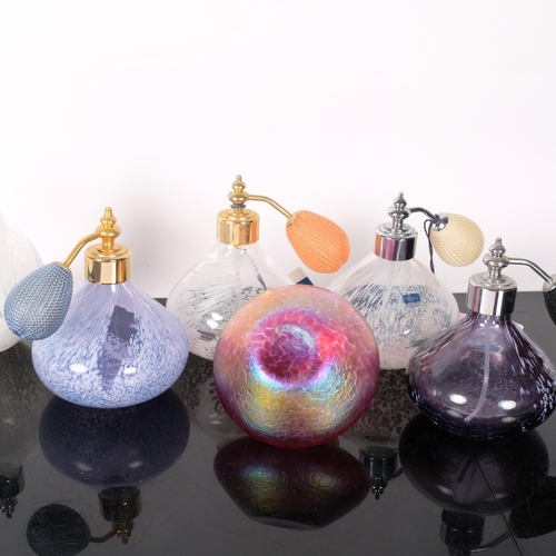 429 - An iridescent glass perfume bottle and stopper, H12cm, and 5 atomiser scent bottles, including Caith... 