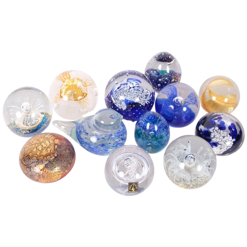 431 - A group of 12 various glass paperweights, including Caithness, Isle of Wight Glass, and Langham