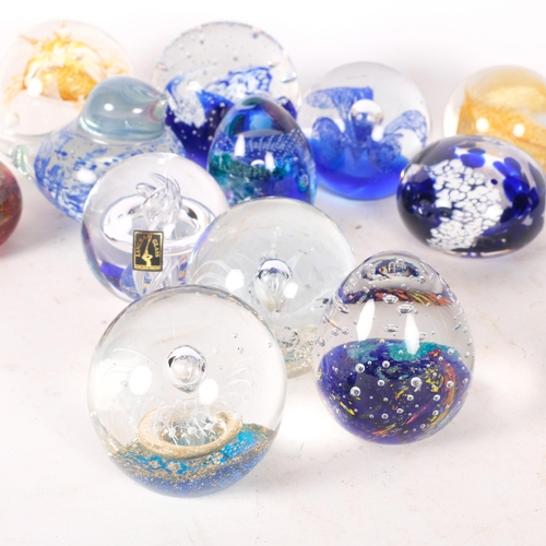 431 - A group of 12 various glass paperweights, including Caithness, Isle of Wight Glass, and Langham