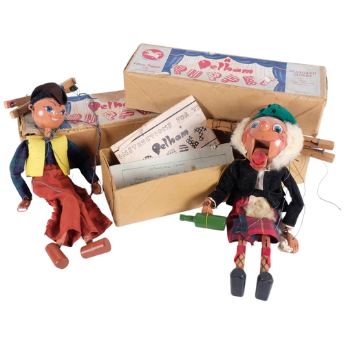 444 - A group of 2 Pelham puppets, in original boxes with associated paperwork, including Mr Macboozle and... 