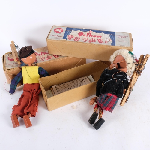 444 - A group of 2 Pelham puppets, in original boxes with associated paperwork, including Mr Macboozle and... 