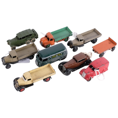 447 - A group of loose Dinky toys, to include a Dodge tipping wagon, several flat bottom trucks and tippin... 