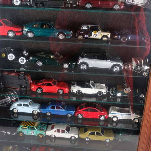 451 - A quantity of loose diecast vehicles, various brands such as Dinky, Corgi and Lledo, in associated g... 