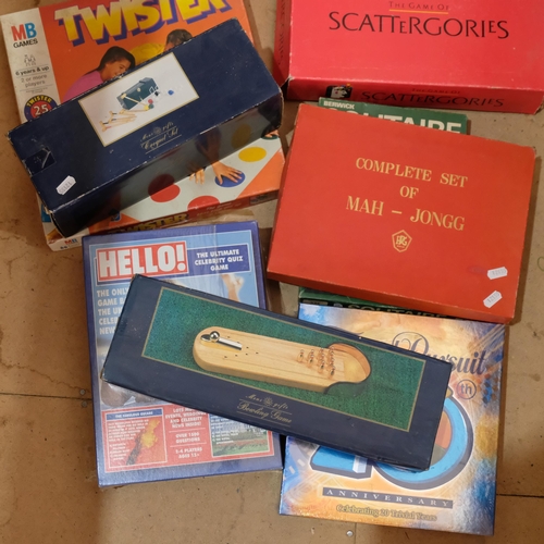 458 - A quantity of Vintage board games, including a complete Mah-jongg set, a table-top croquet set, Soli... 