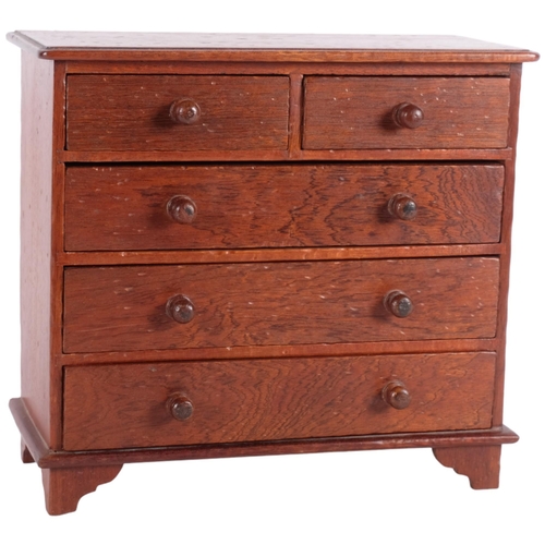 464 - A stained wood table-top collector's chest of 2 short and 3 long drawers, W24.5cm