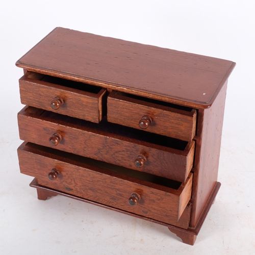 464 - A stained wood table-top collector's chest of 2 short and 3 long drawers, W24.5cm