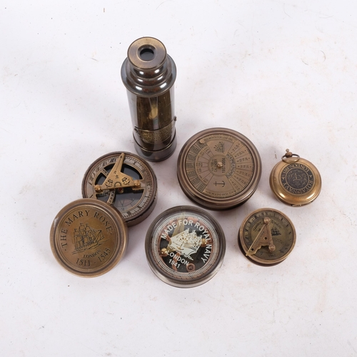 482 - A reproduction brass telescope, compass, perpetual calendar, 7.5cm across, etc