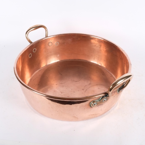 487 - A large Antique 2-handled copper jam pan, 46.5cm overall