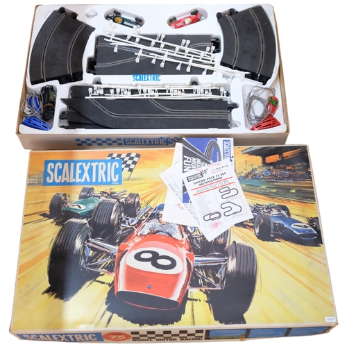 499 - A boxed Scalextric Grand Prix 75 set