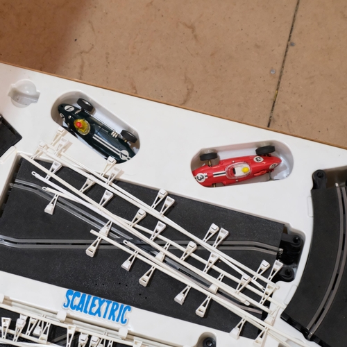 499 - A boxed Scalextric Grand Prix 75 set