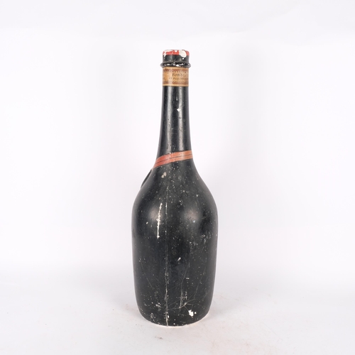 275 - A Vintage French painted plaster shop display bottle, advertising Rocher Freres, H65cm