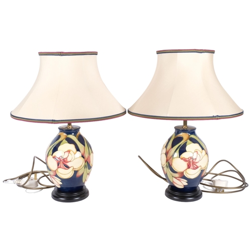 280 - A pair of Moorcroft tube-lined table lamps, with matching shades, designed by Kerry Goodwin, H46cm o... 