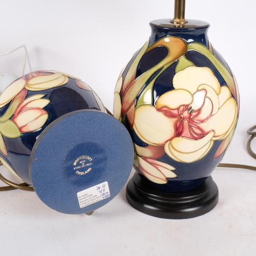 280 - A pair of Moorcroft tube-lined table lamps, with matching shades, designed by Kerry Goodwin, H46cm o... 