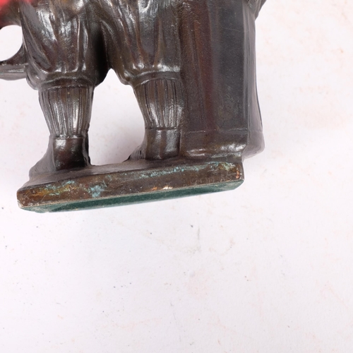 284 - A cast-bronze golfer figure pen holder, H18cm