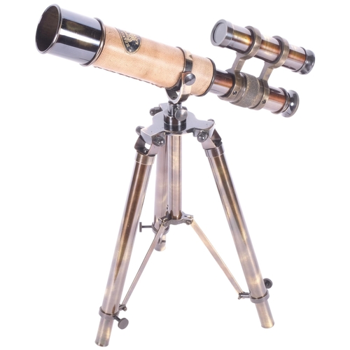 286 - A leather-bound brass telescope on adjustable tripod stand, telescope length 25.5cm